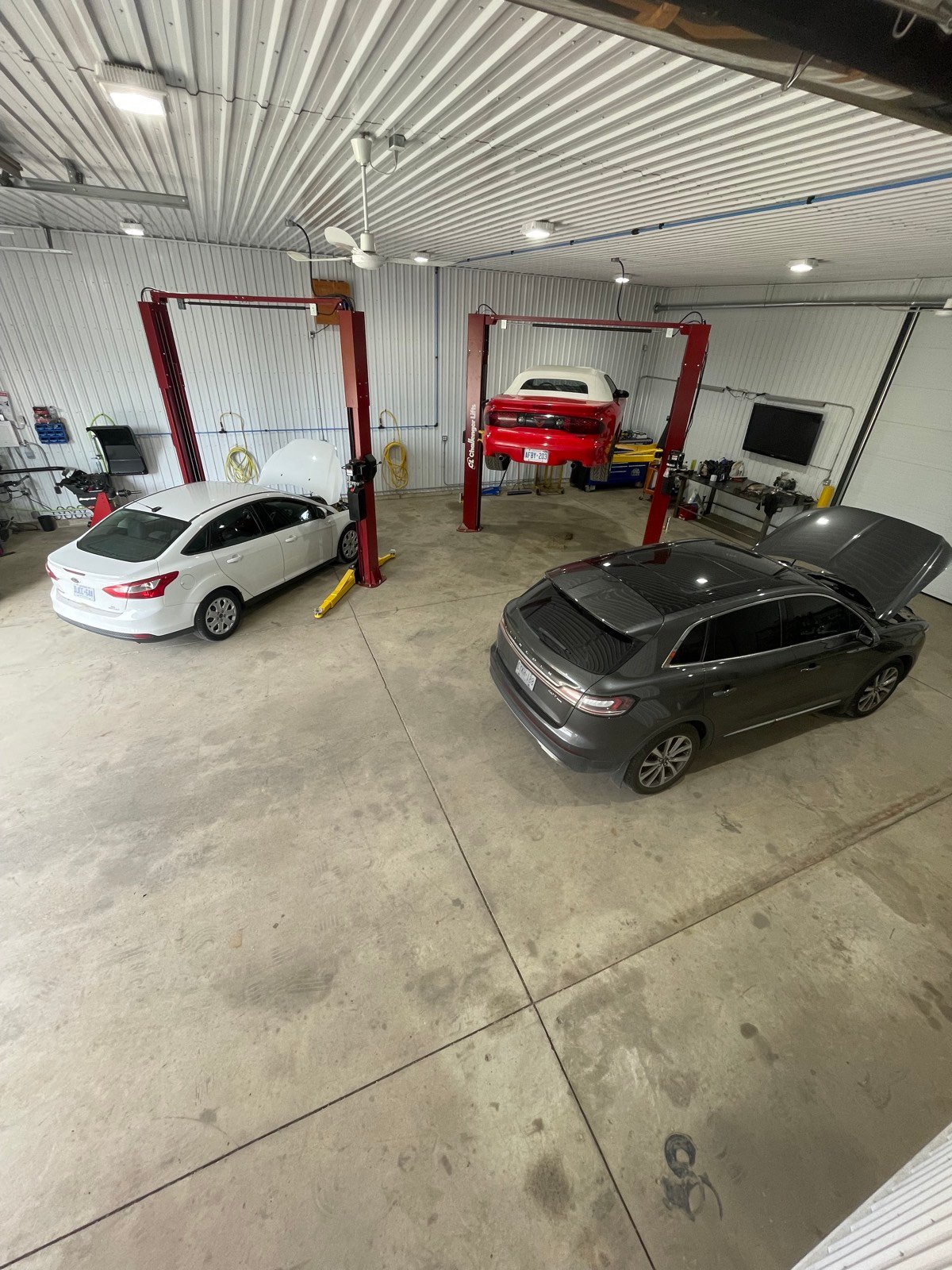 Vehicles parked in the service bays